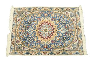 TABRIZ, PERSIAN, RUG with petal shaped circular white medallion with pendant, on a sky blue and