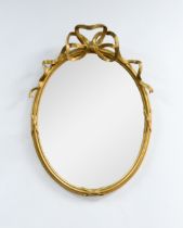 RIBBAND WALL MIRROR: Early to mid-twentieth century gilt-framed wall mirror with ribband cartouche