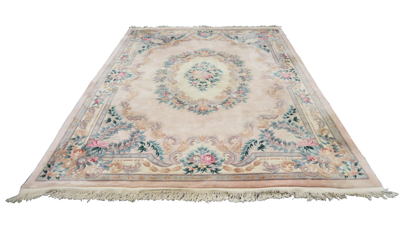 HEAVY QUALITY EMBOSSED, WASHED CHINESE CARPET OF AUBUSSON DESIGN, with large oval centre