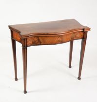 FOLDING CARD TABLE: George III mahogany neo-classical folding card table, the serpentine top opening