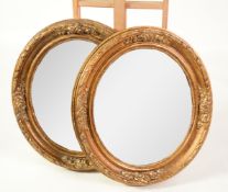 PAIR OF MODERN OVAL WALL MIRRORS, in gilt moulded frames, 20 ½” x 18” (52cm x 45.7cm), (2)