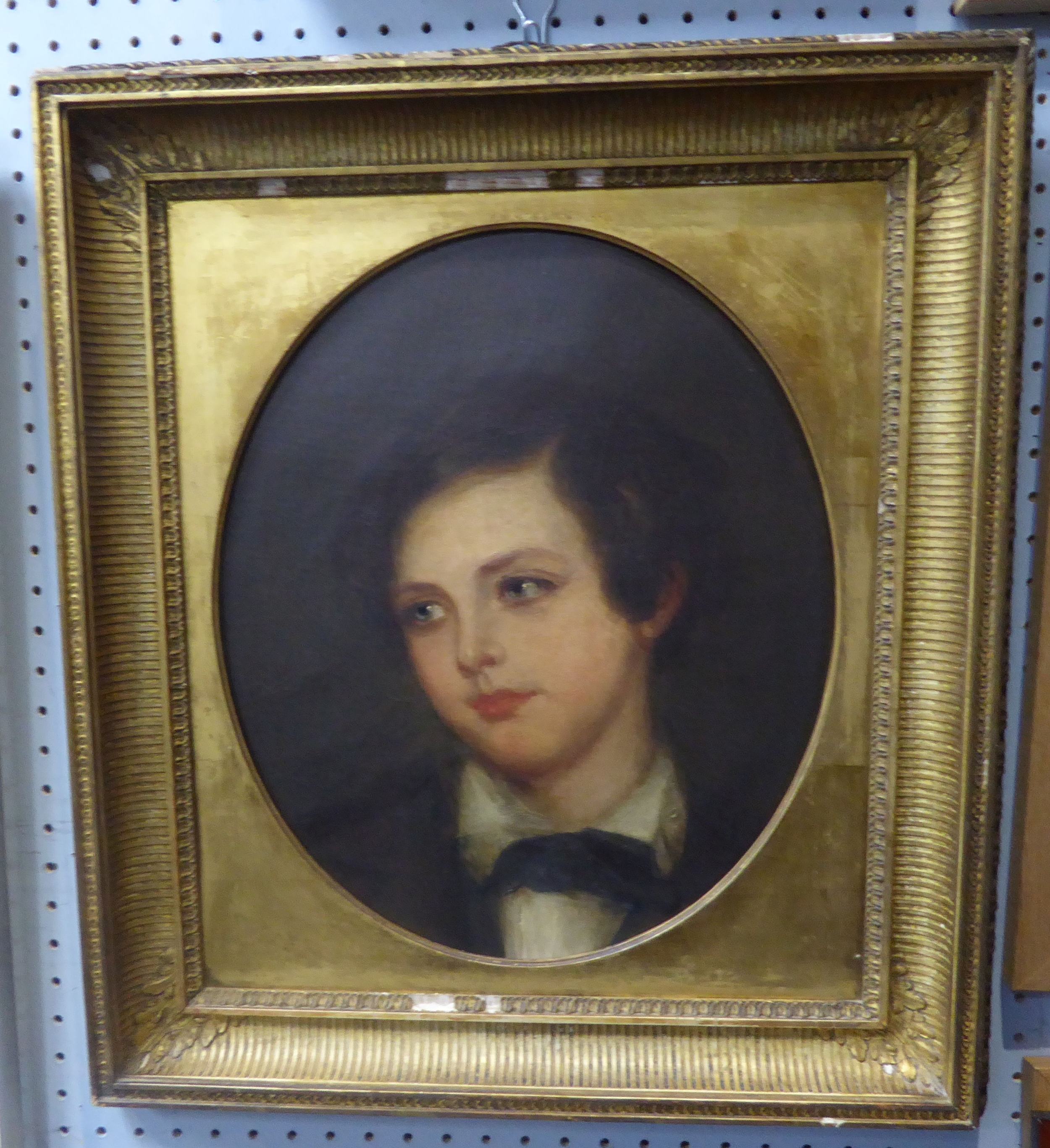 BRITISH SCHOOL (CIRCA 1840) OIL PAINTING ON RE-LINED CANVAS Portrait of a young man in a painted