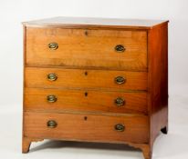 LATE GEORGIAN FIGURED AND CROSSBANDED MAHOGANY SECRETAIRE CHEST, the oblong top outlined in
