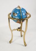 MODERN POLISHED SPECIMEN HARDSTONE GLOBE ON FLOOR STANDING BRASS BASE, the globe with pale blue