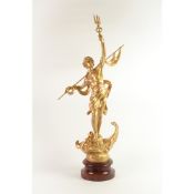 EARLY TWENTIETH CENTURY FRENCH GILT SPELTER FIGURE, modelled as a young man, holding a trident and