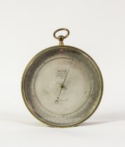 ADIE, 15 PALL MALL, LONDON, BRASS CASED ANEROID BAROMETER, No: 2081, the silvered dial reading