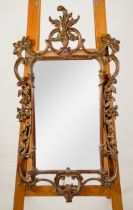 MODERN GILT MIRROR: Burnished gilt effect rococo wall mirror marked ‘A Veronese Product’ verso,