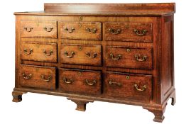 GEORGE III OAK AND MAHOGANY CROSSBANDED LANCASHIRE CHEST, of typical form with low back, part hinged