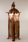 CHARLES VOYSEY STYLE ARTS AND CRAFTS STUDDED COPPER AND LEADED GLASS CEILING LIGHT, in the form of a