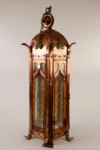 CHARLES VOYSEY STYLE ARTS AND CRAFTS STUDDED COPPER AND LEADED GLASS CEILING LIGHT, in the form of a