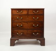 GEORGE II MAHOGANY CHEST OF DRAWERS, the moulded oblong top above two short and three long