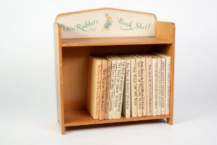 CIRCA 1970 incomplete set of 15 FREDERICK WARNE & CO, BEATRIX POTTER books contained in wooden '