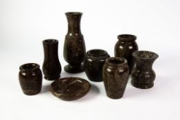 CORNISH SERPENTINE: Collection of vases and pin dish in dark hues with blots and striations, 7” (