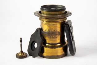 ANTIQUE BRASS LENS: A 19th century A. Grubb A3 Waterhouse Stop Brass lens with rack and pinion
