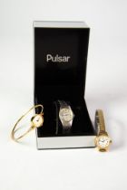LADY'S PULSAR WRISTWATCH with quartz movement, oval dial with batons, textured case and integral