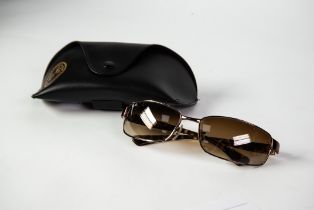 PAIR OF RAY-BAN SUNGLASSES with imitation tortoiseshell sides in associated case