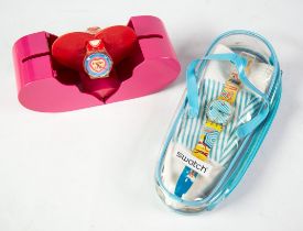 TWO LIMITED EDITION SWATCH WRISTWATCHES IN SPECIAL PACKAGING, ‘BIKINI BEACH’ GE128, (2004) and ‘TIME