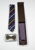 PATEK PHILIPPE, GENEVE, (No 2010) PURE SILK TIE, dark blue and pink striped, in associated box;