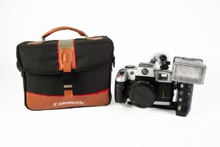 CANOMATIC SLR ROLL FILM CAMERA, with ELECTRONIC FLASH UNIT, HOT SHOE ATTACHMENT and EXTENSION BAR,