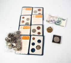 FOUR PLASTIC WALLETS OF 'BRITAINS FIRST DECIMAL COINS'; a quantity of BRITISH AND FOREIGN COINS,