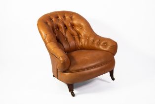 HOWARD & SONS LATE 19TH/EARLY 20TH CENTURY SPOON-BACKED EASY ARMCHAIR, button upholstered and