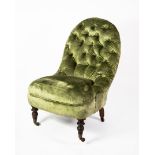 VICTORIAN SPOON-BACKED ARMLESS EASY CHAIR, button upholstered in green velvet, on turned tapering