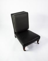 HOWARD & SONS VICTORIAN 'SLIPPER' LOW-SEATED ARMLESS EASY CHAIR, the rectangular high back having