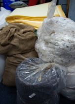 QUANTITY OF UPHOLSTERY FILLING, ROLLS OF WOOL-COTTON, POLYESTER AND FELT WADDING, LARGE BAG OF