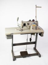 JUKI, JAPANESE, INDUSTRIAL TWO THREAD OVERLOCKING SEWING MACHINE, on table stand, with single