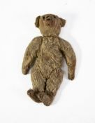 PROBABLY GERMAN, EARLY 20th CENTURY TEDDY BEAR, pale golden mohair, black button eyes, stitched nose