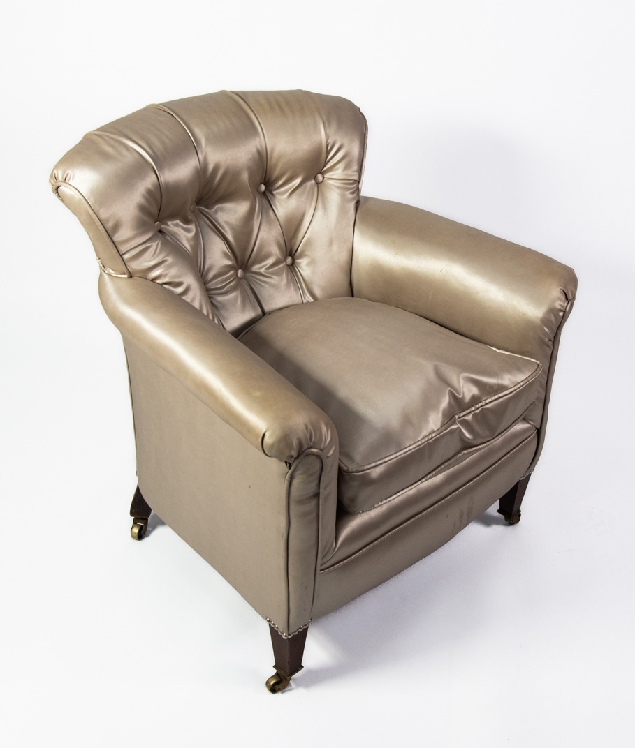 HOWARD & SONS, LATE 19TH/EARLY 20TH CENTURY SMALL LOUNGE CHAIR with slightly fan-shaped back, button