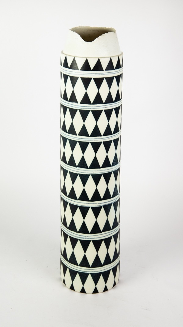 L’OBJET BLACK AND WHITE GEOMETRIC- PATTERN PORCELIAN SLEEVE VASE, with shaped rim, 21 ¼” (54cm)