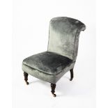 VICTORIAN LOW SEATED ARMLESS EASY CHAIR, the upholstered back with scrolled-over top and the seat