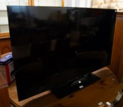 A PANASONIC LED 50" FLAT SCREEN TV WITH REMOTE (TX-50JX87OB)