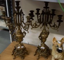 A PAIR OF LARGE BRASS FIVE BRANCH CANDELABRA (A.F.)