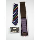 PATEK PHILIPPE, GENEVE, (No 2010) PURE SILK TIE, dark blue and pink striped, in associated box;