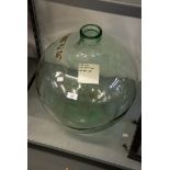 A LARGE CLEAR GLASS CARBOY