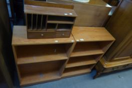 A PAIR OF SMALL PINE FINISH THREE TIER OPEN BOOKCASES; A WOOD EFFECT TABLE TOP STATIONERY RACK, WITH