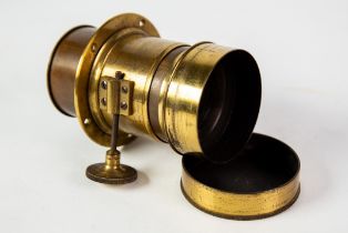 ANTIQUE BRASS LENS: 19th century adjustable focus brass portrait lens marked D Haas et Cie, Paris;