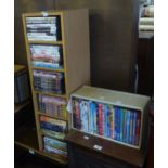 A BLOND WOOD FIVE TIER DVD AND 40 DVDS, INCLUDING SETS SUCH AS ‘THE GREAT WAR’ (6) AND ‘THE WORLD AT