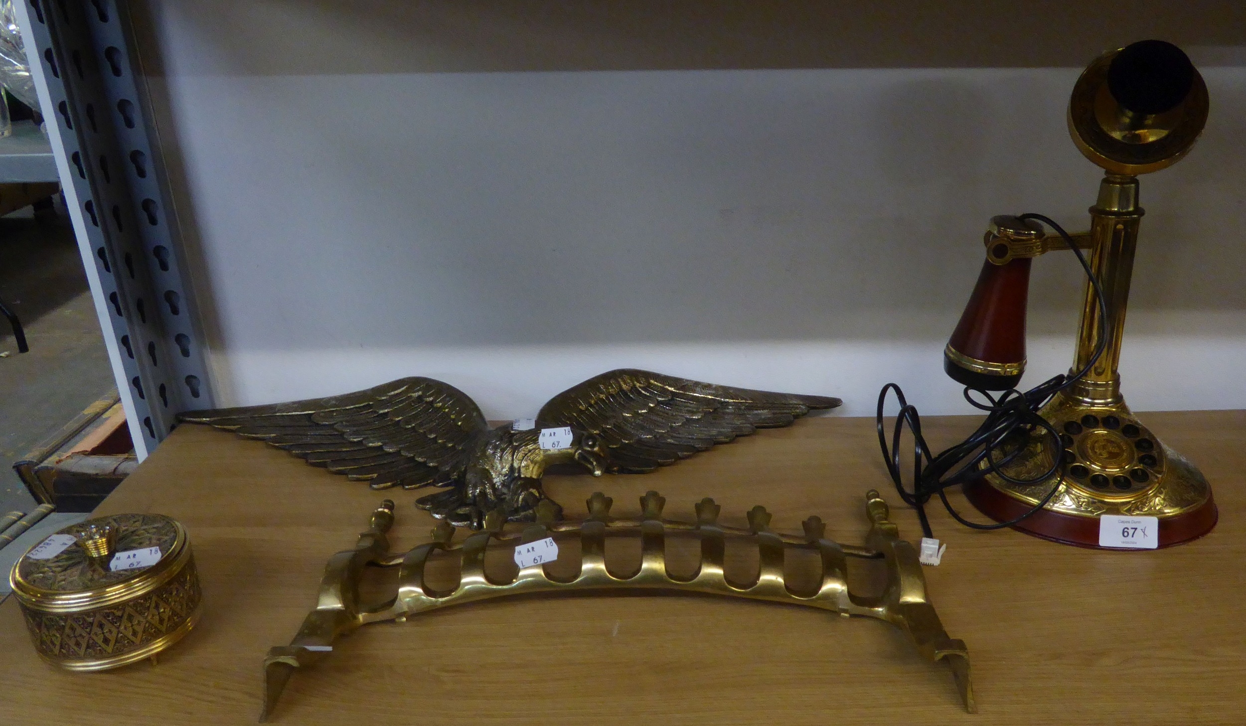 A SMALL GROUP OF BRASS ITEMS TO INCLUDE; FIRE GRILLE, AMERICAN EAGLE, MUSIC BOX, AND A STICK