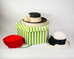 DELLA, ENGLAND; LADY'S WHITE BROAD-BRIMMED HAT with broad black band; BLACK HAT with broad cream