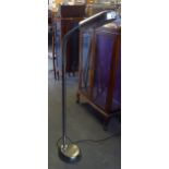 A MODERN METAL FLOOR STANDING READING LAMP WITH ADJUSTABLE TOP, HEAVY CIRCULAR BASE