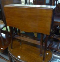 A WALNUT SUTHERLAND TABLE