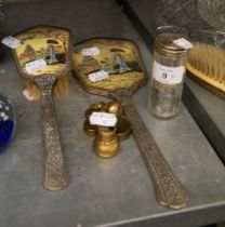 A GLASS TOILET JAR WITH SILVER LID AND A THREE PIECE BRUSH SET