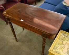 A GEORGE III MAHOGANY FOLD OVER TEA TABLE (LEAF DETACHED, A.F.)