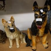 A LARGE POTTERY ALSATIAN DOG AND A SIMILAR SMALLER DOG (2)