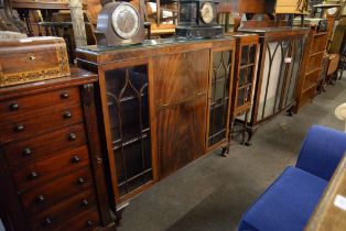 A PRE-WAR MAHOGANY BOOKCASE WITH CENTRAL PULL DOWN WRITING COMPARTMENT, FLANKED BY TWO ASTRAGAL