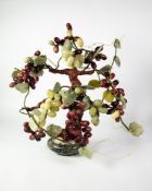 GEM TREE: Large 20th century nephrite gem tree in the form of a vine with red and white grapes