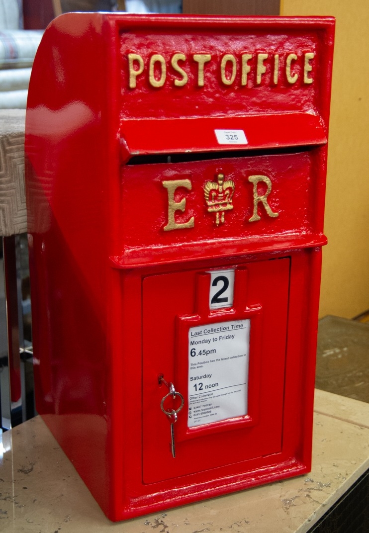 A REPRODUCTION BRITISH POST BOX, IN RED WITH GOLD COLOURED WRITING